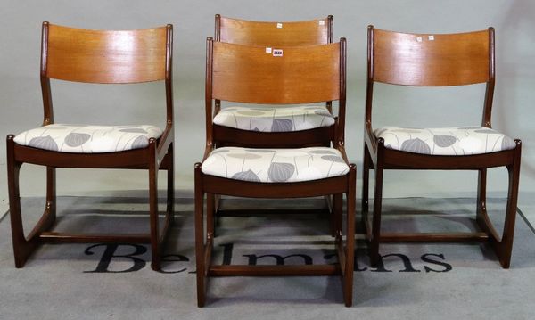 A set of four G-plan style teak dining chairs with upholstered seats