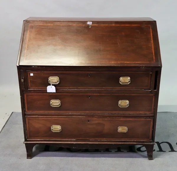 A George III style inlaid mahogany bureau