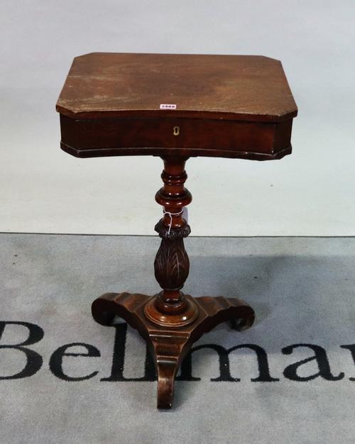 A late Victorian mahogany concave work table