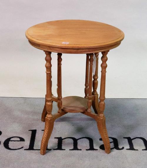 A modern beech circular centre table