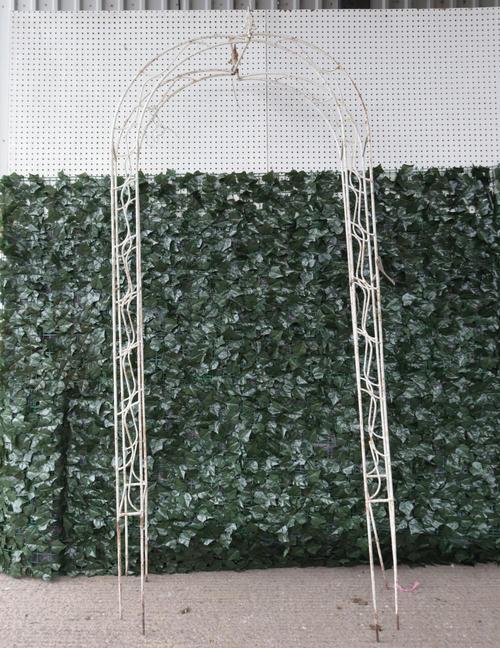A early 20th century white painted metal garden arch, 100cm wide; 225cm high (a.f)