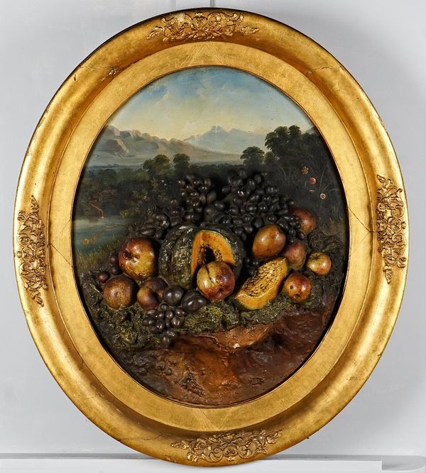 A Victorian diorama of fruit in a landscape