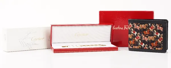 A Must de Cartier ballpoint pen, numbered 296345, with box and booklets and a Salvatore Ferragamo wallet (2)