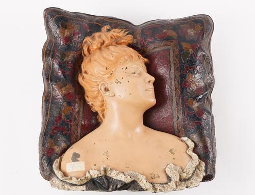 A polychrome painted spelter sculpture