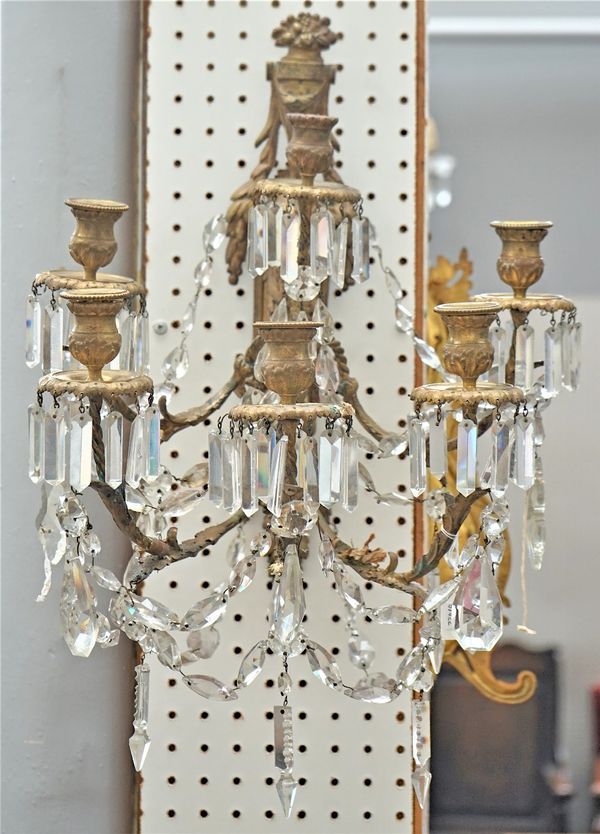 A PAIR OF EMPIRE STYLE GILT-METAL SIX-LIGHT WALL APPLIQUES