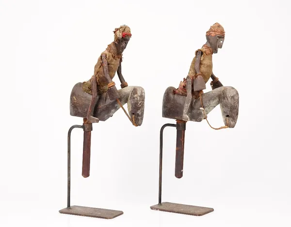 Tribal interest; a pair of carved hardwood hand puppets