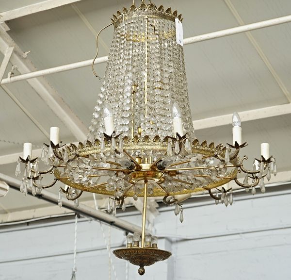 A Regency style gilt metal and cut glass twelve-light chandelier
