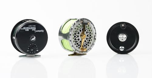 A Bickersteth Classic 2 fly fishing reel, 10cm diameter, with pouch and a System Two 1011 Scientific Anglers 3M reel with a spare spool, in a Snowbee...