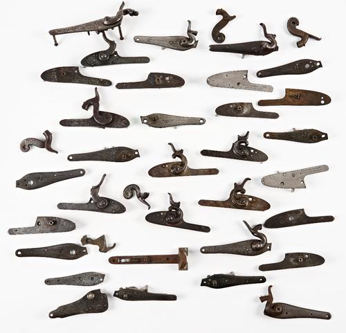 Thirty-one side plates, mostly with engraved decoration