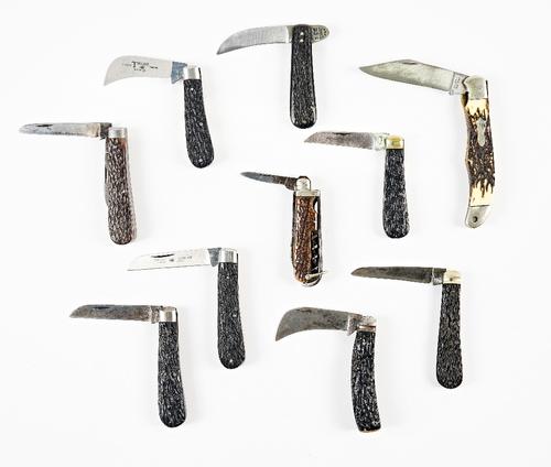 Ten bone handled pocket knives (10)