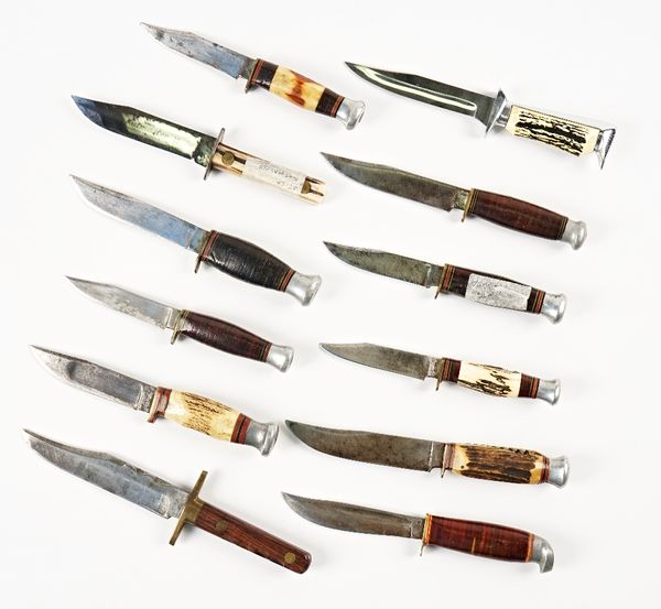 Ten early 20th century hunting knives, and two later knives (12)