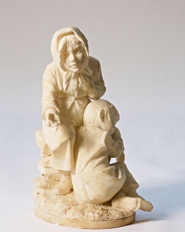 A carved alabaster figure group of two children begging