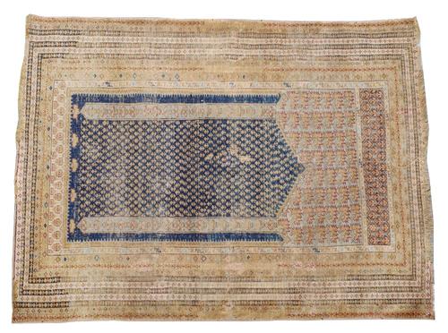 A Turkish prayer rug, the flower filled mahrab with two columns rising to a flower arch with numerous minor borders, 156cm x 116cm.