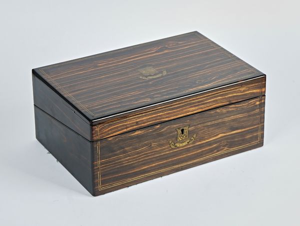 A 19th century brass inlaid coromandel writing slope with fitted interior, 36cm wide; 15cm high