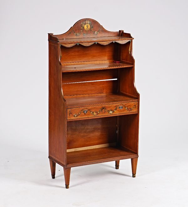 A late 19th century polychrome painted satinwood waterfall four-tier open bookcase