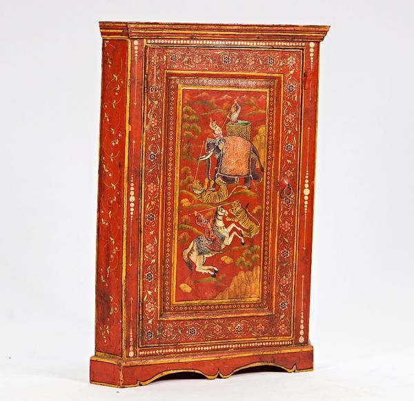 An 18th century oak hanging corner cabinet, later polychrome painted with an Indian scene depicting a tiger hunt, 71cm wide x 98cm high.
