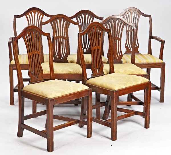 A set of eight George III style mahogany dining chairs with pierced splat on canted square supports, to include a pair of carvers (8).