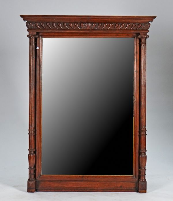 A late 19th century French oak mirror, with gadrooned frieze and fluted columns, 115cm wide x 152cm high.
