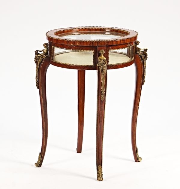 A late 19th century French walnut and kingwood circular bijouterie table.
