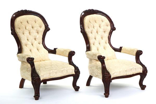 A PAIR OF HARDWOOD FRAMED OPEN ARMCHAIRS