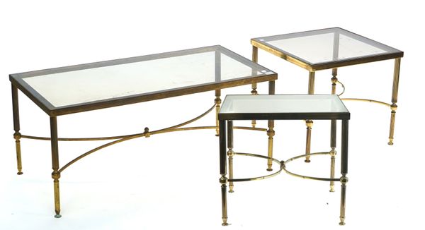 A SUITE OF THREE MID-20TH CENTURY LACQUERED BRASS AND SMOKED GLASS COFFEE TABLES