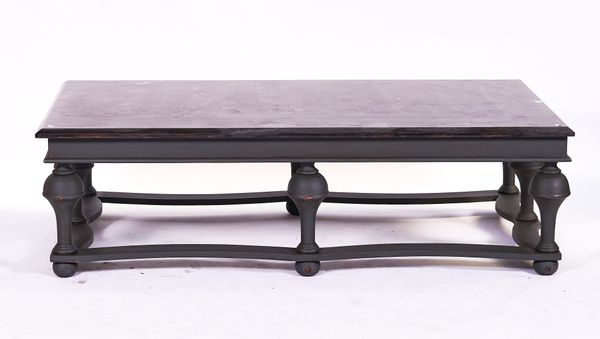A LARGE RECTANGULAR MARBLE TOPPED COFFEE TABLE