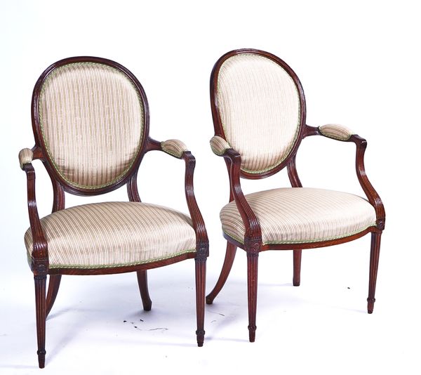 A PAIR OF HEPPLEWHITE MAHOGANY FRAMED OPEN ARMCHAIRS