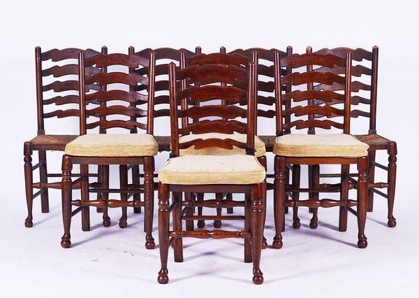 A MATCHED SET OF EIGHT 20TH CENTURY LANCASHIRE LADDERBACK DINING CHAIRS