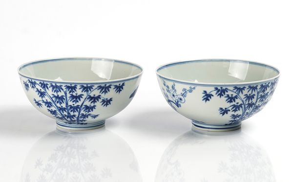 A PAIR OF CHINESE BLUE AND WHITE `THREE FRIENDS' BOWLS