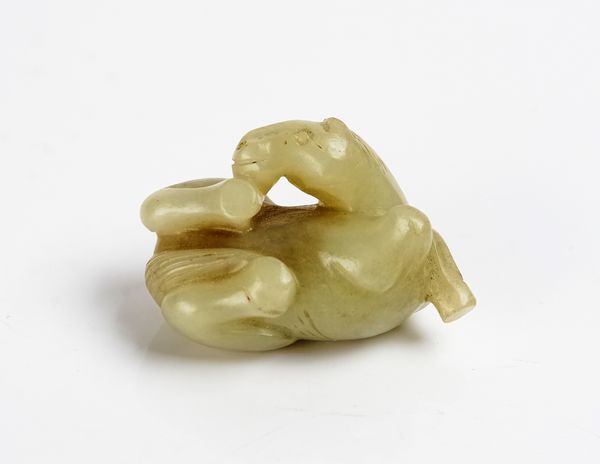 A CHINESE MING STYLE CELADON JADE HORSE