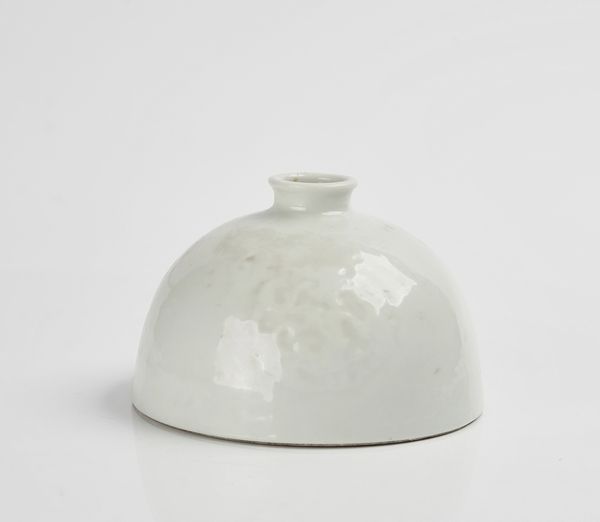 A CHINESE WHITE GLAZED PORCELAIN BEEHIVE WATER POT