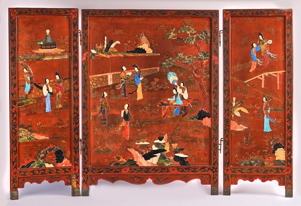 A CHINESE THREE-PANEL RED LACQUER AND HARDSTONE INLAID SCREEN