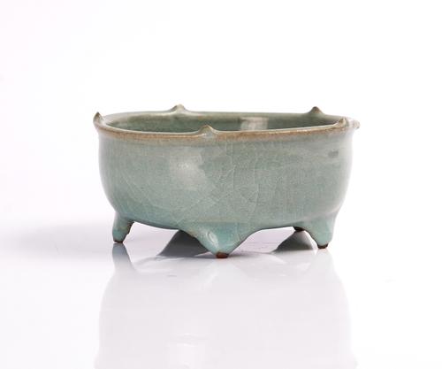 A CHINESE CELADON GLAZED BOWL