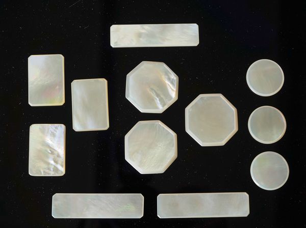 A GROUP OF THIRTY THREE CHINESE MOTHER-OF-PEARL GAMING COUNTERS