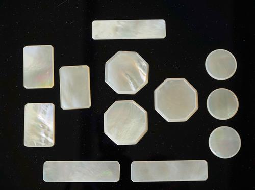 A GROUP OF THIRTY THREE CHINESE MOTHER-OF-PEARL GAMING COUNTERS