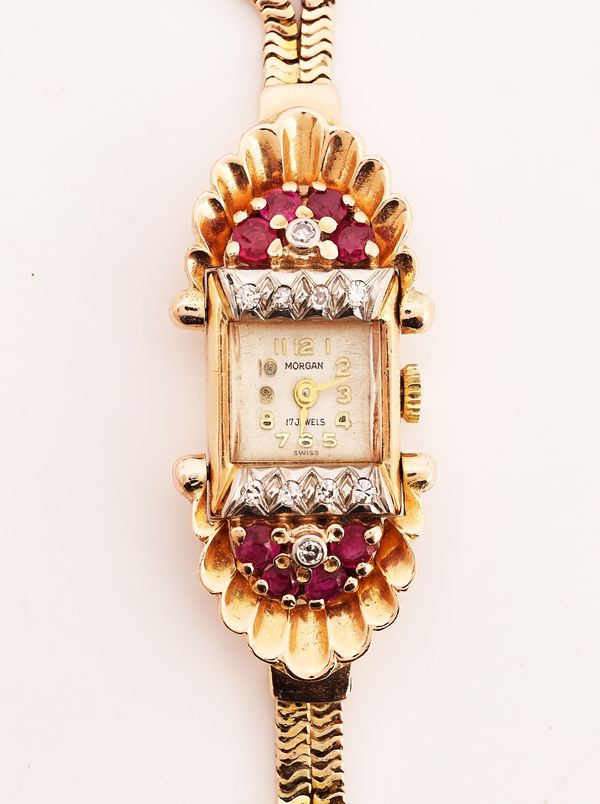 A GOLD, RUBY AND DIAMOND DRESS COCKTAIL WATCH