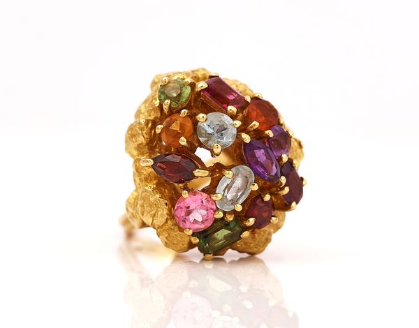 AN 18CT GOLD AND VARICOLOURED GEMSTONE SET CLUSTER RING