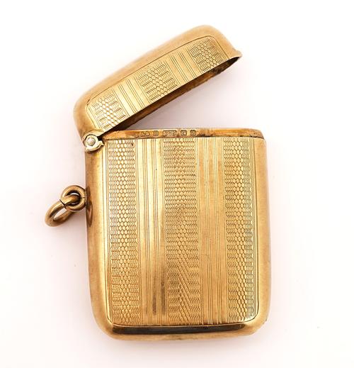 A 9CT GOLD CURVED RECTANGULAR VESTA CASE