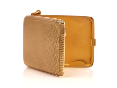 A 9CT GOLD RECTANGULAR BOOK MATCHES CASE