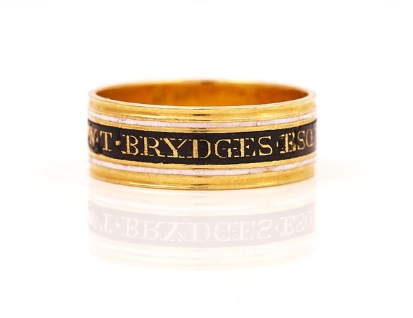 A GEORGE III GOLD, BLACK AND WHITE ENAMELLED MOURNING BAND