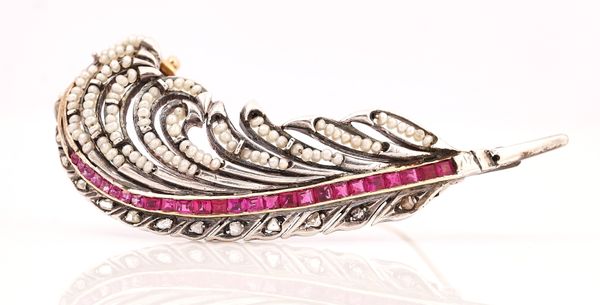 A SYNTHETIC RUBY, DIAMOND AND SEED PEARL BROOCH