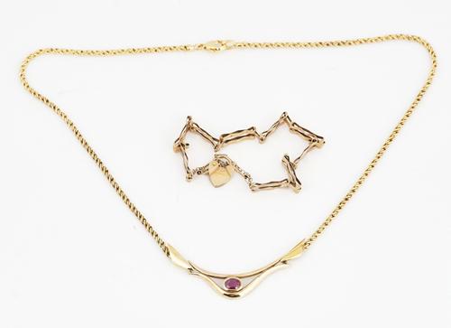 A 9CT GOLD BRACELET AND A 9CT GOLD NECKLACE (2)