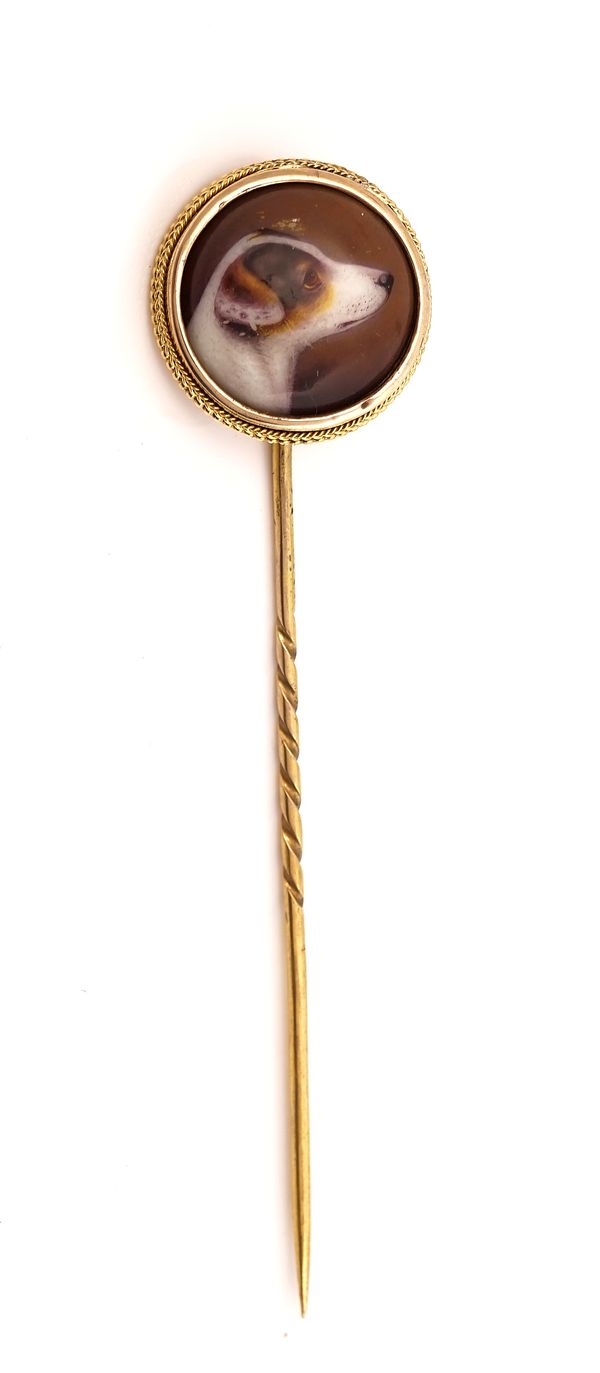 A VICTORIAN GOLD MOUNTED ENAMELLED STICKPIN