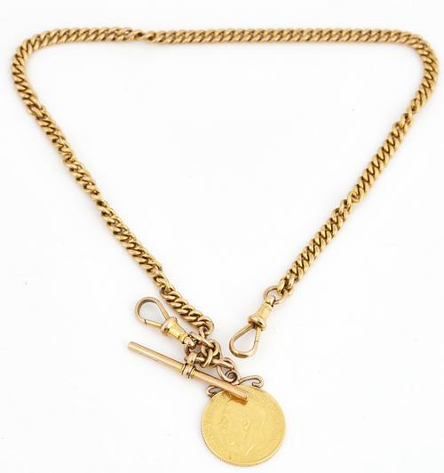 A 9CT GOLD CURB LINK WATCH ALBERT CHAIN AND A SOVEREIGN FOB PENDANT (2)