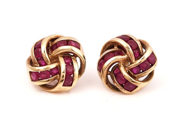 A PAIR OF GOLD AND RUBY EARSTUDS