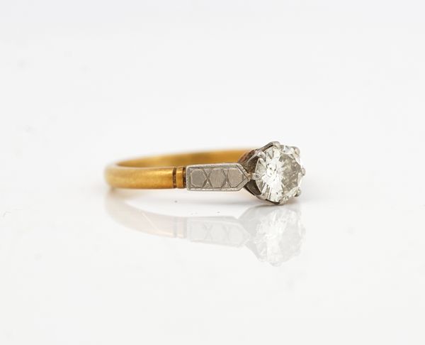 A GOLD AND PLATINUM, DIAMOND SINGLE STONE RING