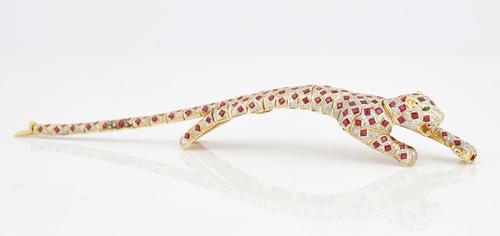 A GOLD, RUBY, DIAMOND AND EMERALD BRACELET