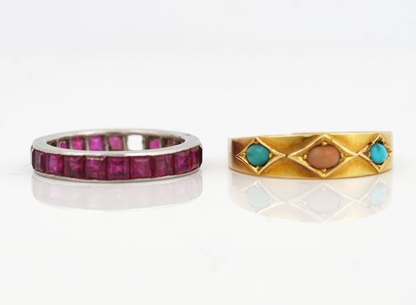 A RUBY FULL ETERNITY RING AND ANOTHER RING (2)