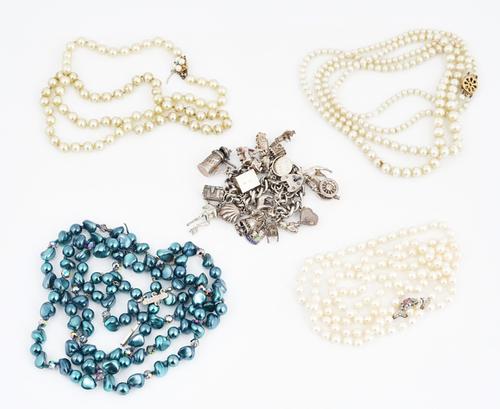 A SILVER CURB LINK CHARM BRACELET AND FOUR NECKLACES (5)