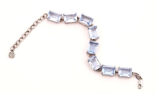 A SILVER AND PALE BLUE TOPAZ BRACELET